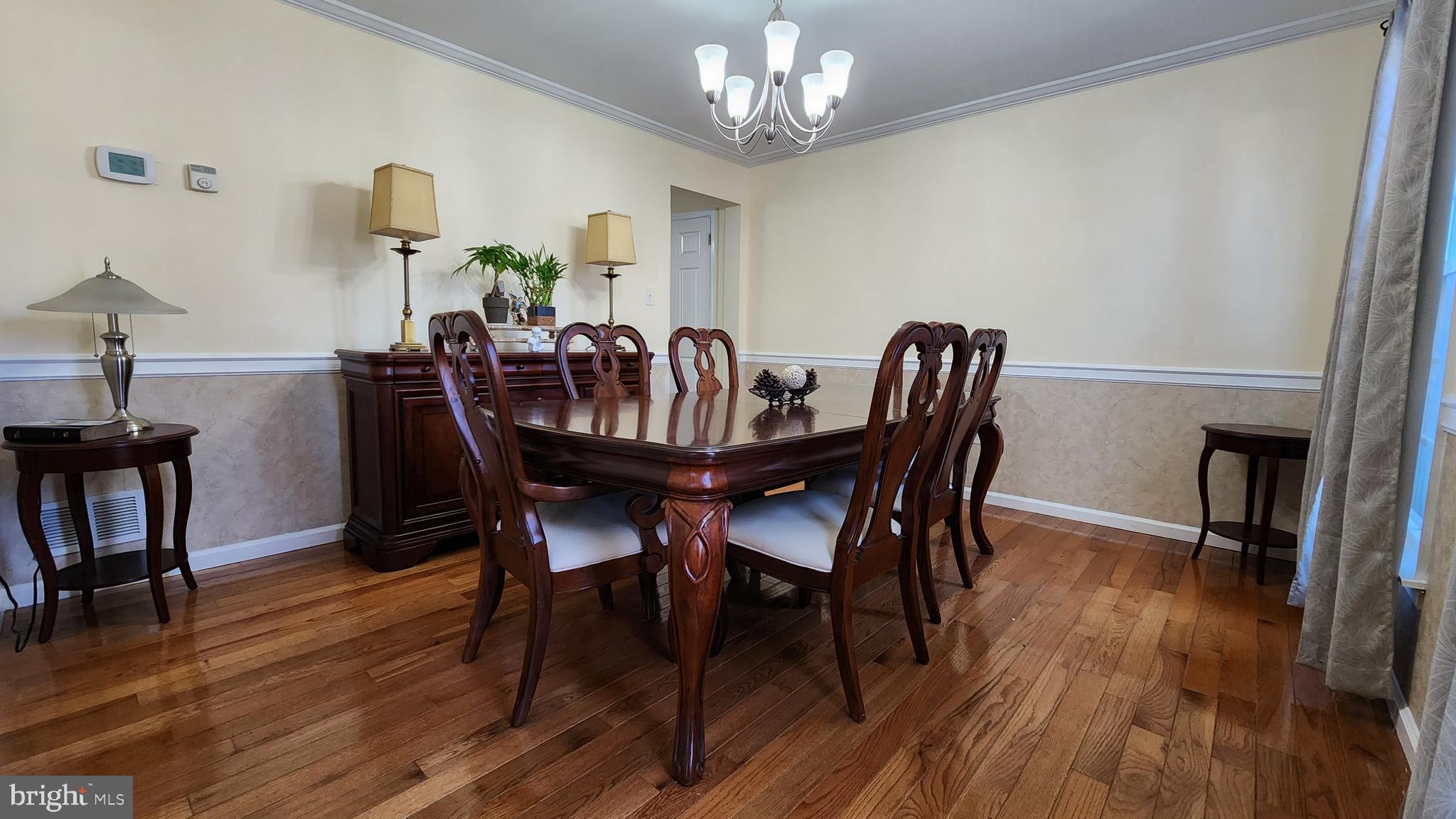 46 Currant Drive Newark, DE 19702 - Photo 18 of 47 a view of a dining room with furniture and wooden floor