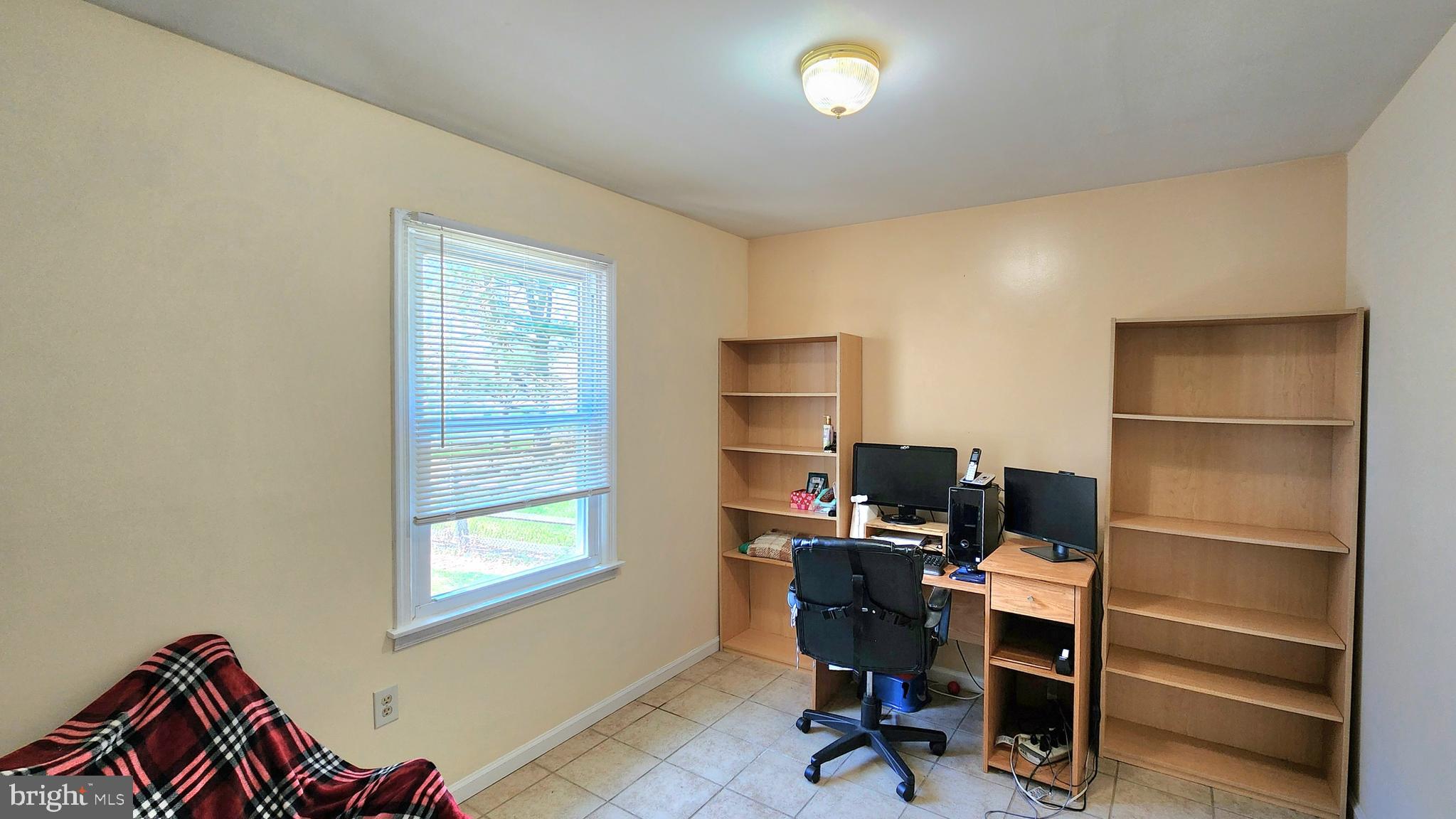 46 Currant Drive Newark, DE 19702 - Photo 22 of 47 a view of a workspace with furniture and a window