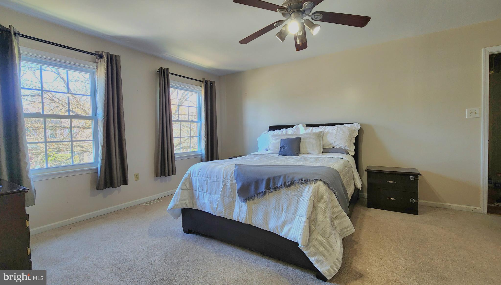 46 Currant Drive Newark, DE 19702 - Photo 26 of 47 a bedroom with a bed and window