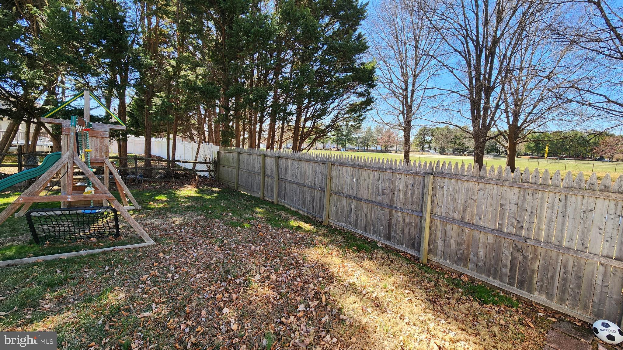 46 Currant Drive Newark, DE 19702 - Photo 4 of 47 a view of a yard with wooden fence