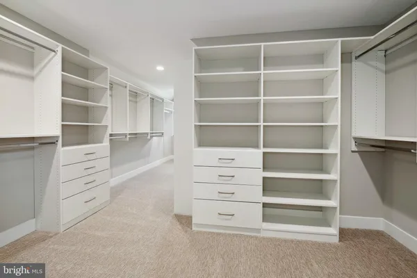 a view of an empty walk in closet