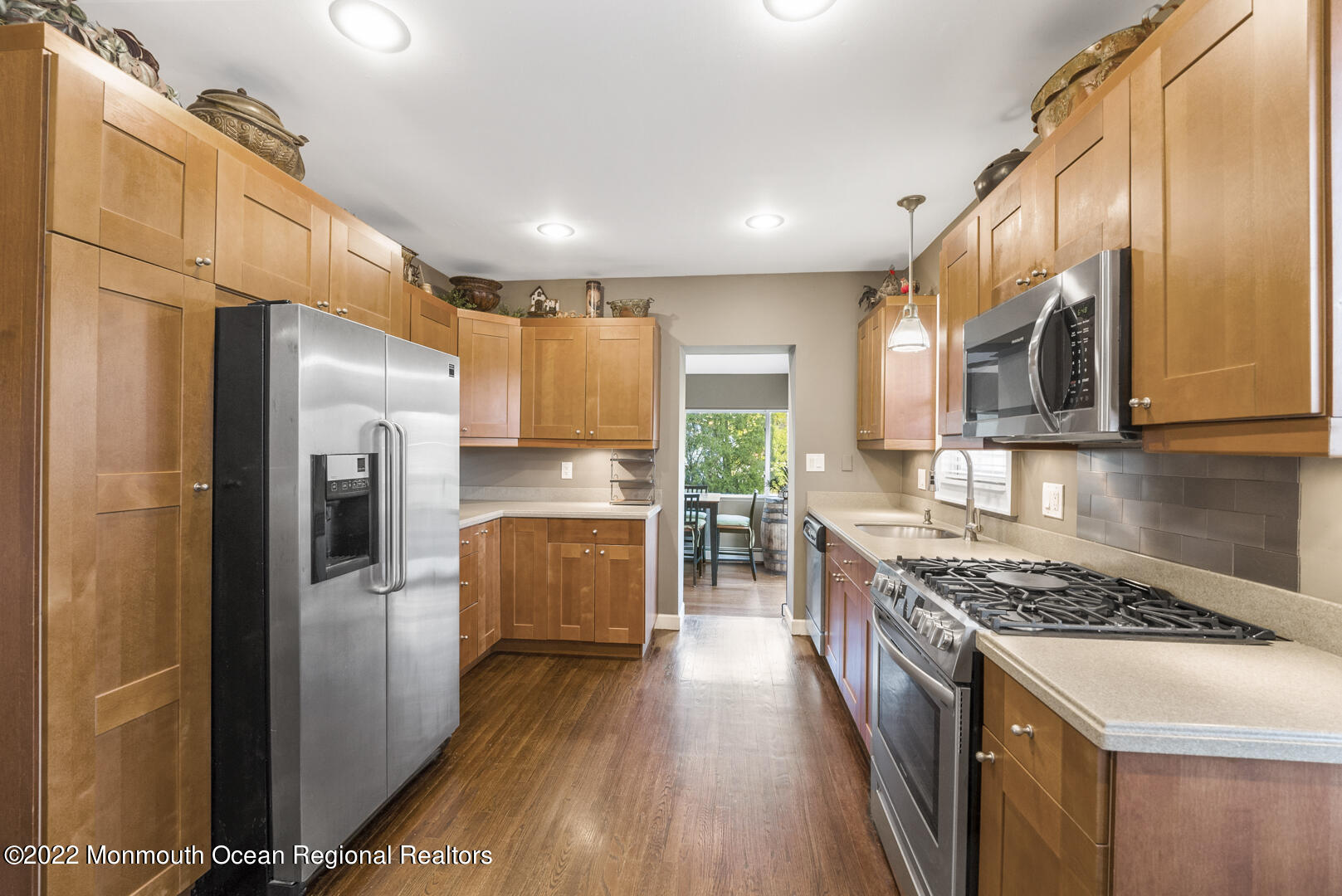 2112 Foster Road Point Pleasant, NJ 08742 - Photo 17 of 57 a kitchen with stainless steel appliances granite countertop a refrigerator a stove top oven a sink and dishwasher