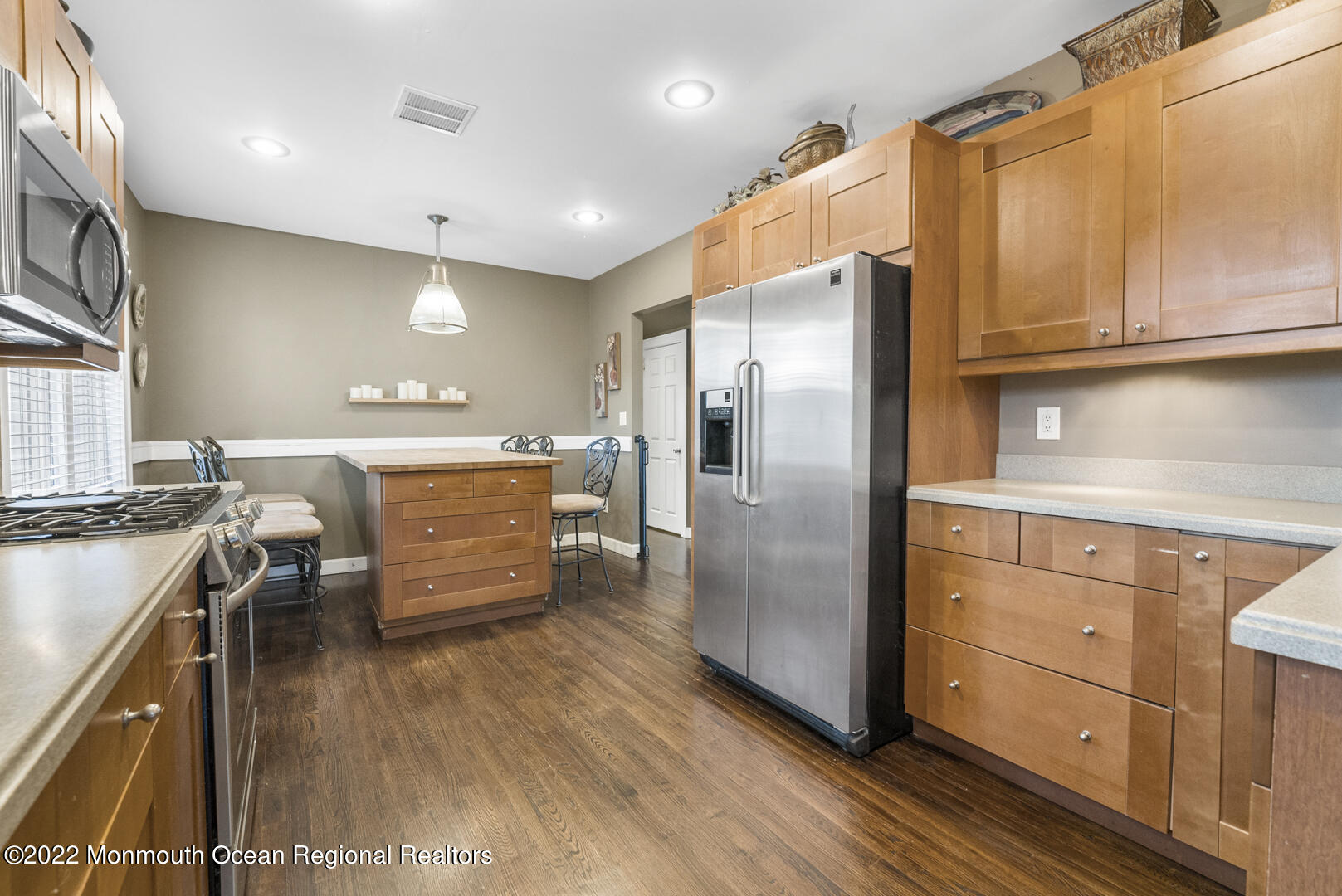 2112 Foster Road Point Pleasant, NJ 08742 - Photo 19 of 57 a kitchen with stainless steel appliances granite countertop a refrigerator a stove and a wooden floors