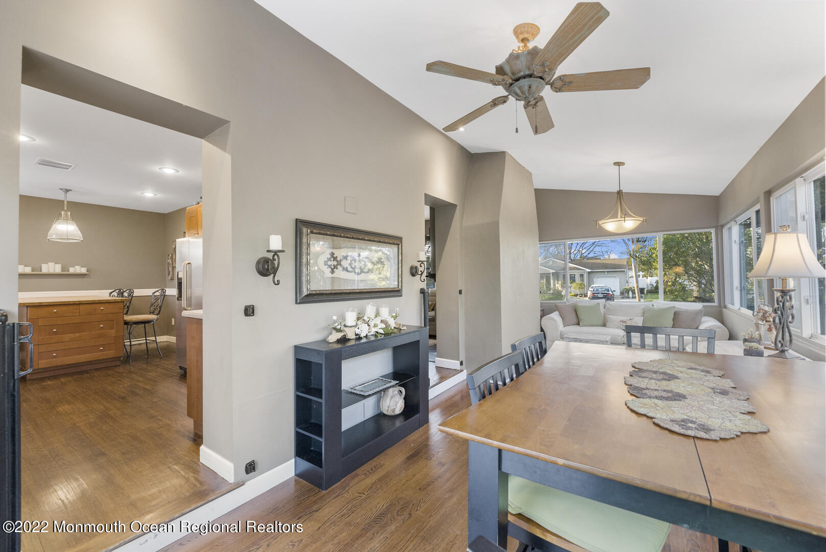 2112 Foster Road Point Pleasant, NJ 08742 - Photo 21 of 57 a view of a dining room with furniture and a chandelier fan