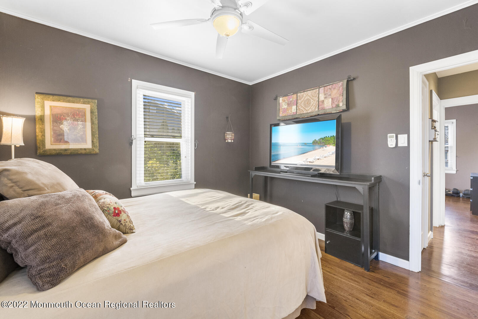 2112 Foster Road Point Pleasant, NJ 08742 - Photo 23 of 57 a bedroom with a bed and a flat screen tv
