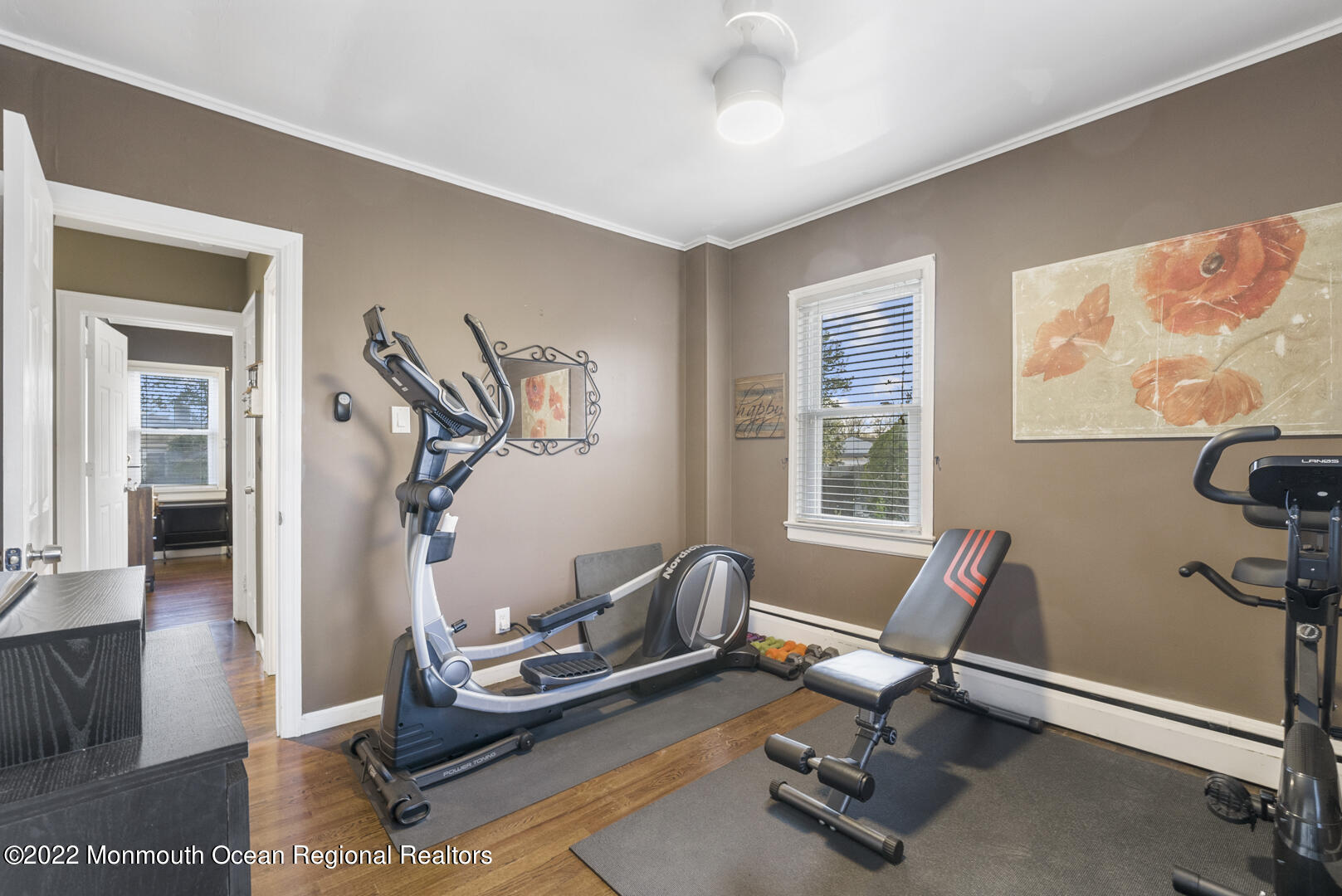 2112 Foster Road Point Pleasant, NJ 08742 - Photo 27 of 57 a room with gym equipment and windows