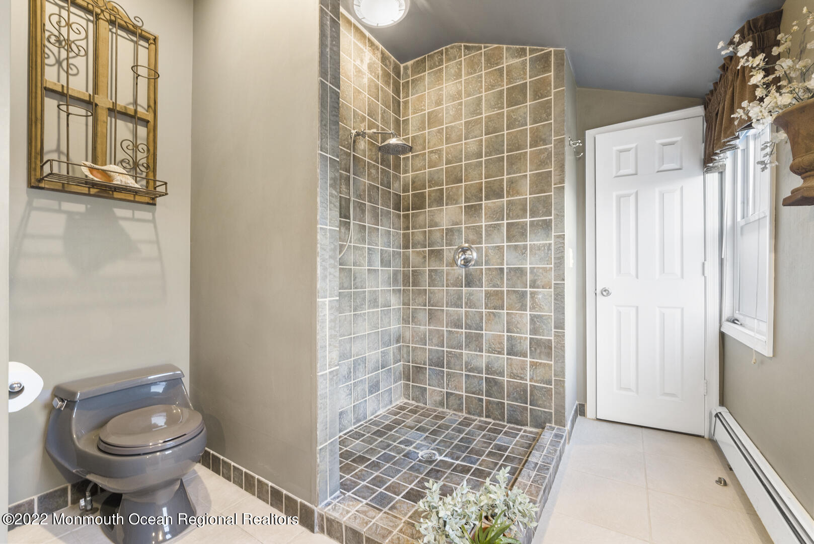 2112 Foster Road Point Pleasant, NJ 08742 - Photo 36 of 57 a bathroom with a toilet and a shower