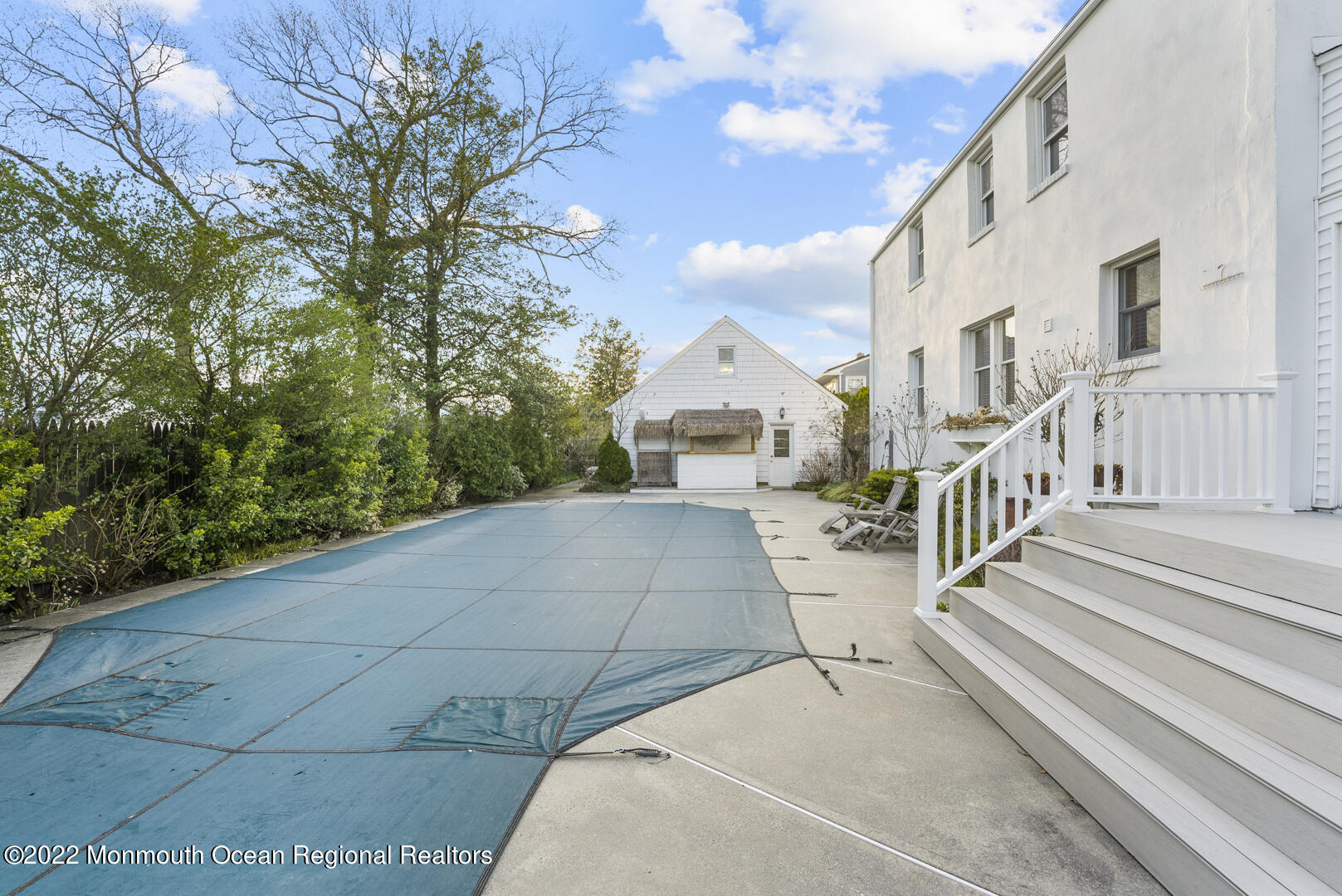 2112 Foster Road Point Pleasant, NJ 08742 - Photo 45 of 57 a view of a patio with couches and table with potted plants