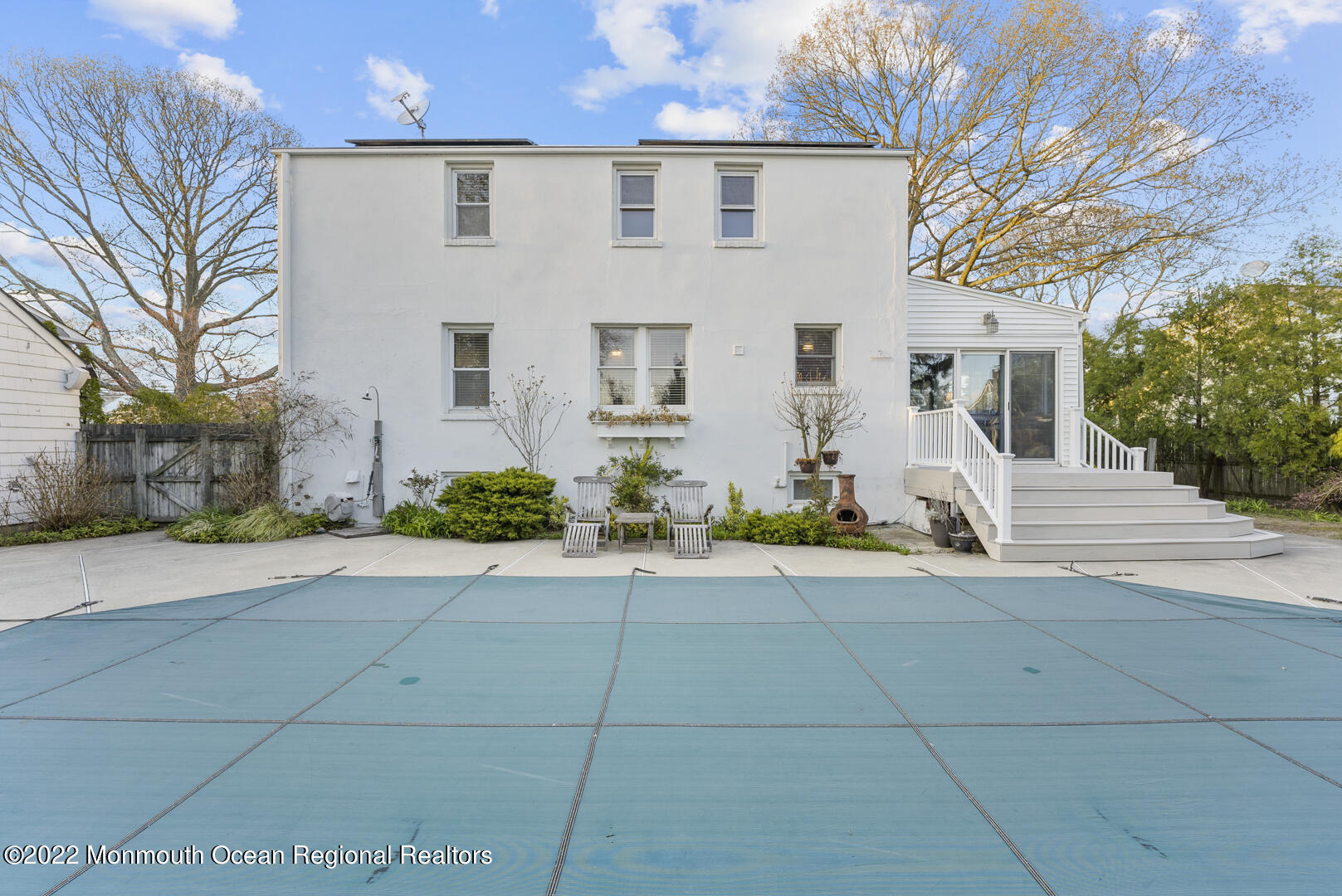 2112 Foster Road Point Pleasant, NJ 08742 - Photo 49 of 57 a view of a white house with a street