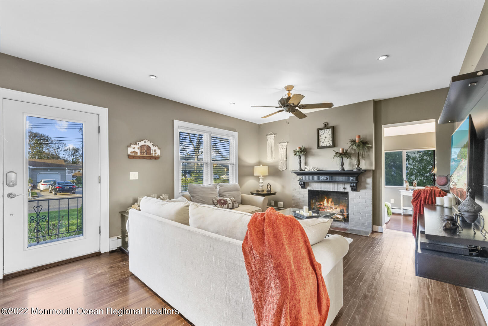 2112 Foster Road Point Pleasant, NJ 08742 - Photo 5 of 57 a living room with fireplace furniture and a fireplace
