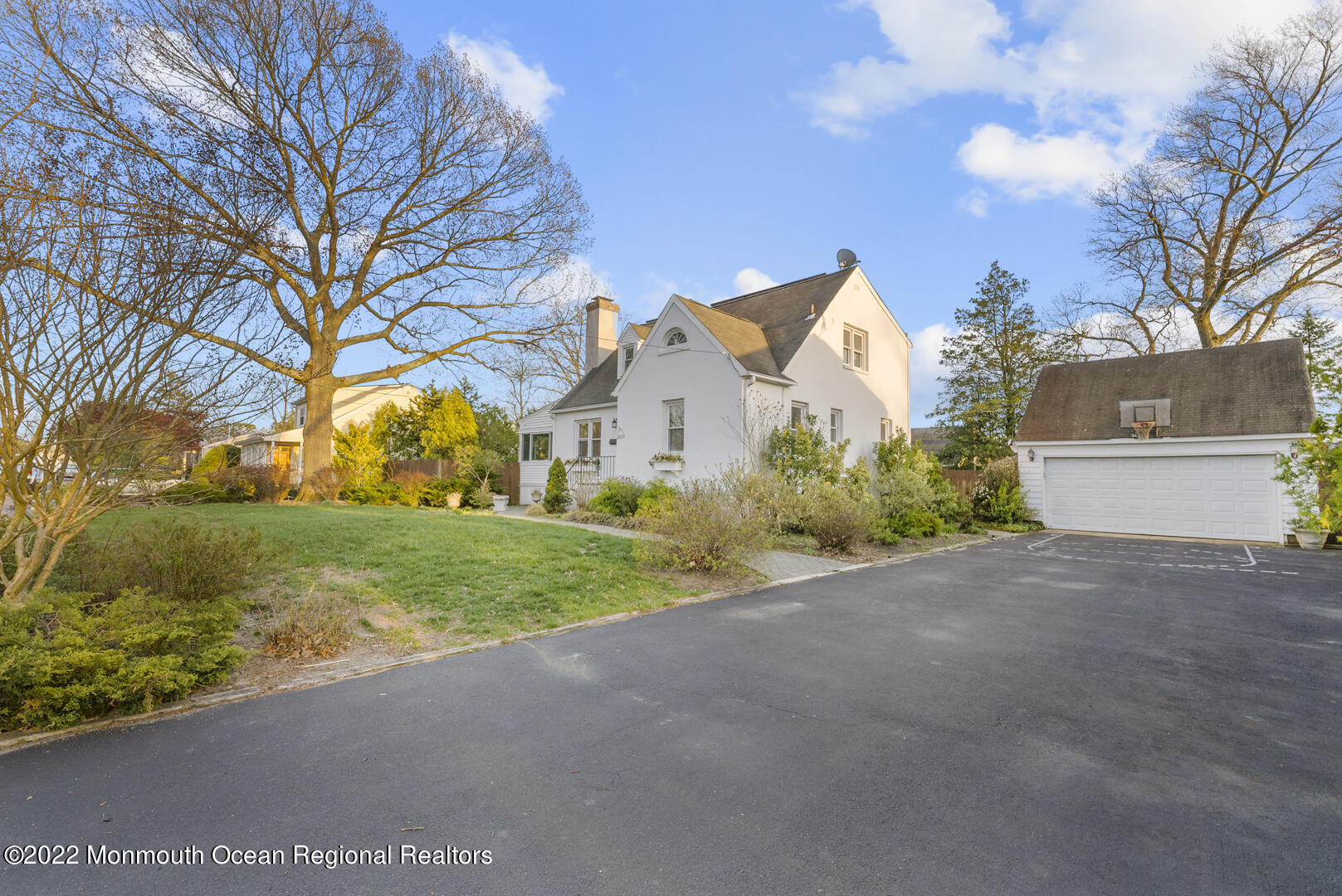 2112 Foster Road Point Pleasant, NJ 08742 - Photo 51 of 57 a view of a house with a yard and large tree