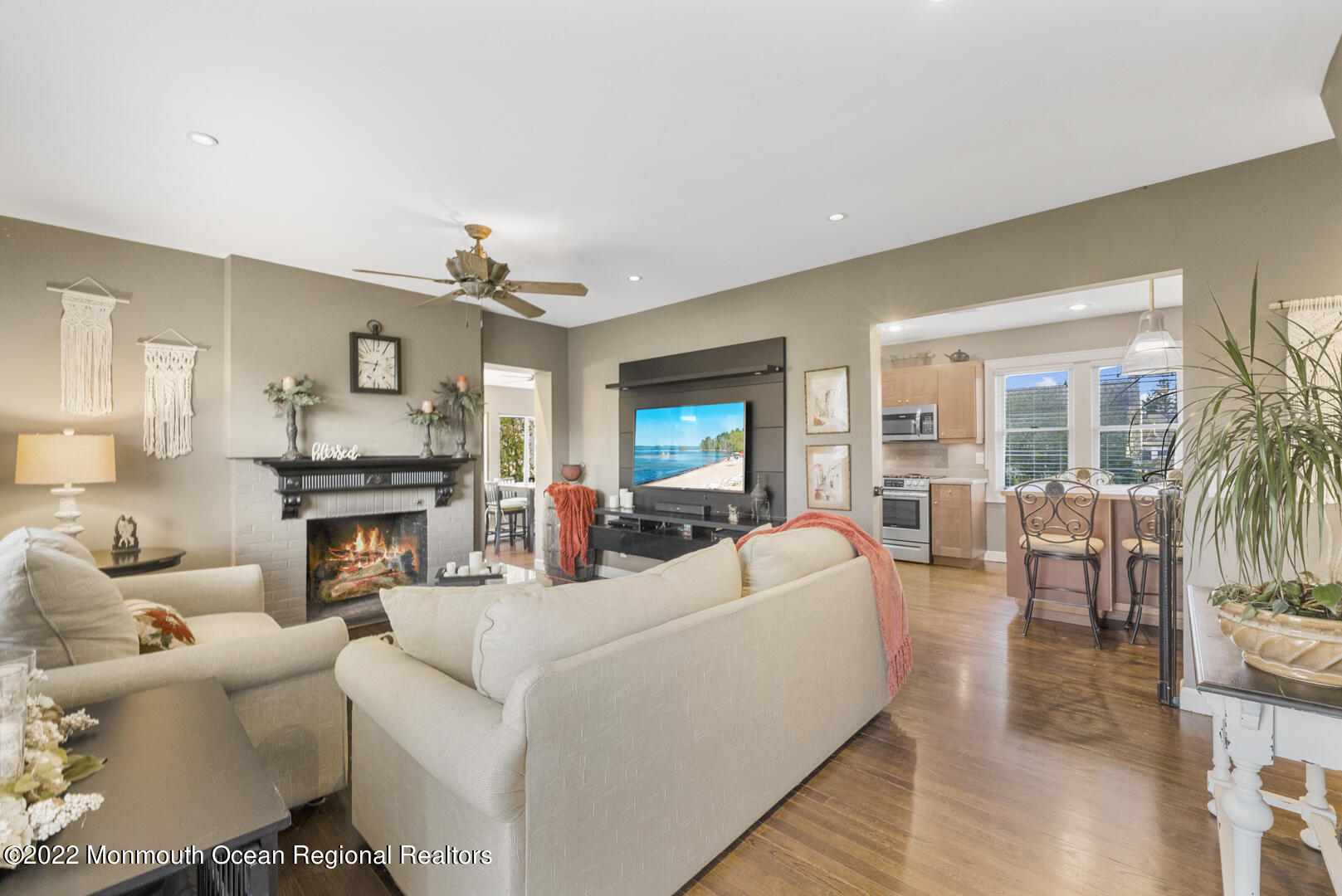 2112 Foster Road Point Pleasant, NJ 08742 - Photo 9 of 57 a living room with furniture and a fireplace