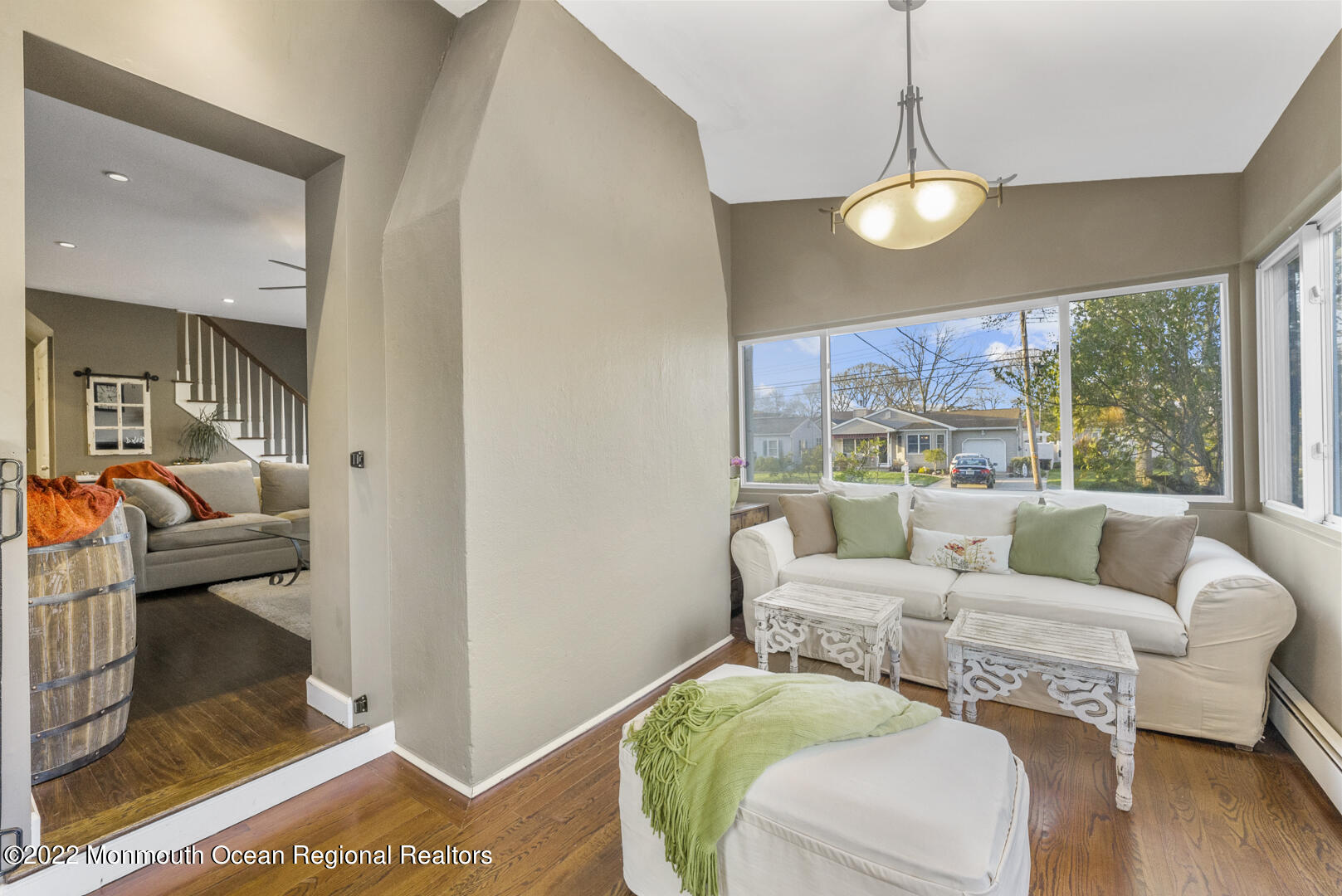 2112 Foster Road Point Pleasant, NJ 08742 - Photo 10 of 57 a living room with furniture and a large window
