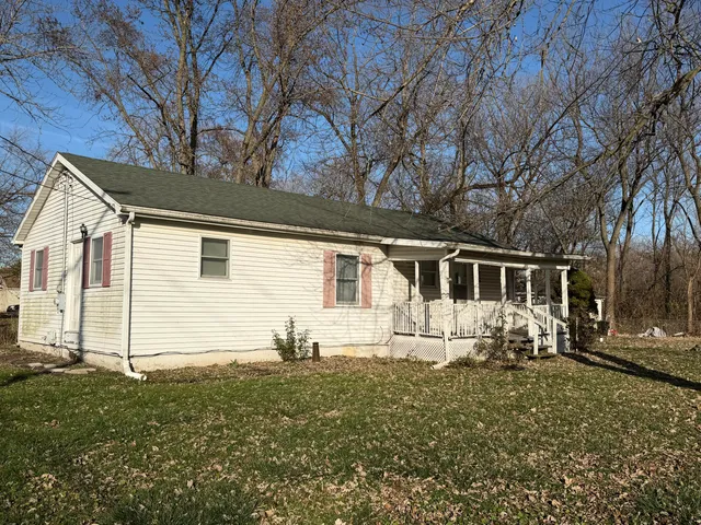 a front view of a house with yard