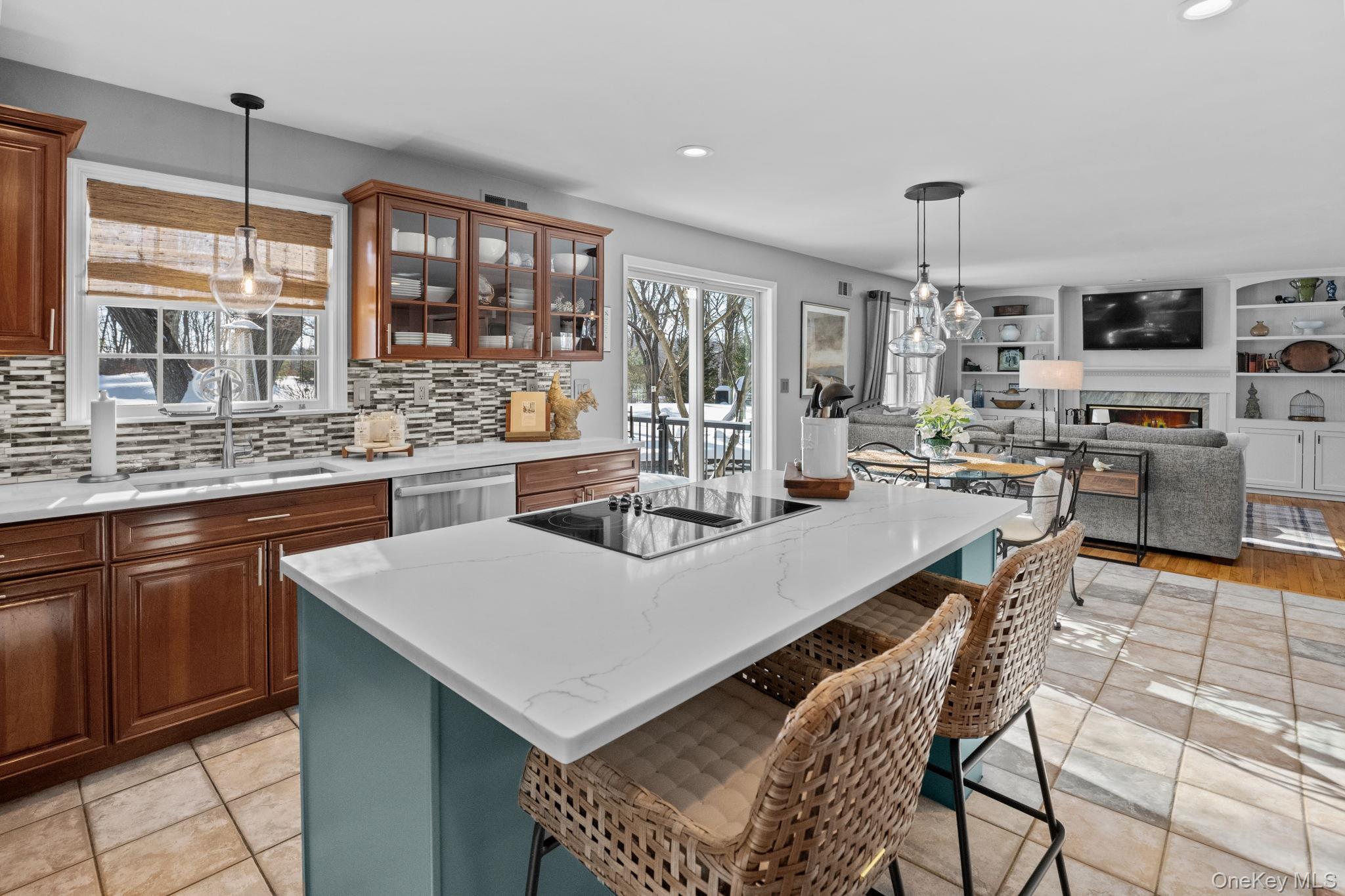 6 Ridge Circle Mahopac, NY 10541 - Photo 12 of 49 a large kitchen with a table and chairs