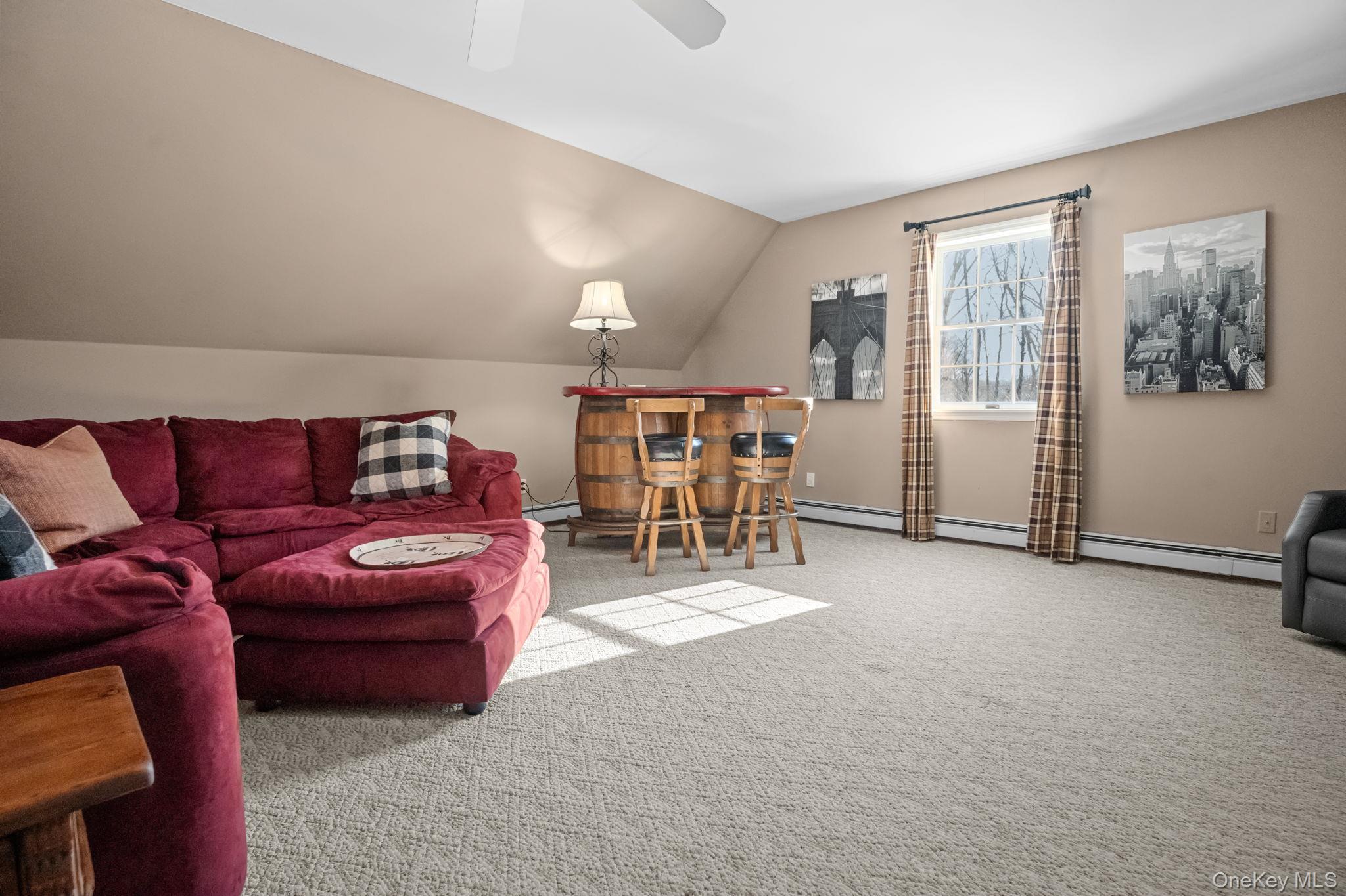 6 Ridge Circle Mahopac, NY 10541 - Photo 21 of 49 a living room with furniture and a window