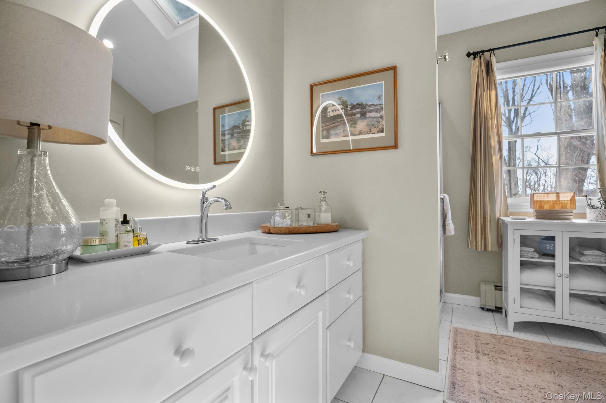 6 Ridge Circle Mahopac, NY 10541 - Photo 26 of 49 a bathroom with a sink and a mirror