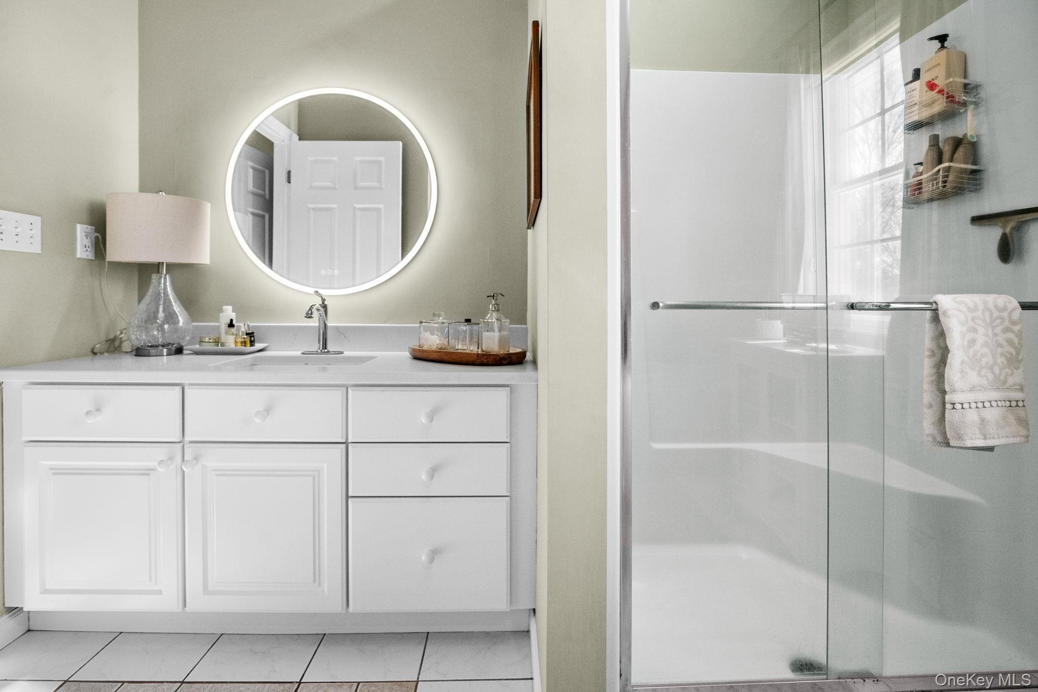 6 Ridge Circle Mahopac, NY 10541 - Photo 27 of 49 a bathroom with a sink and a mirror