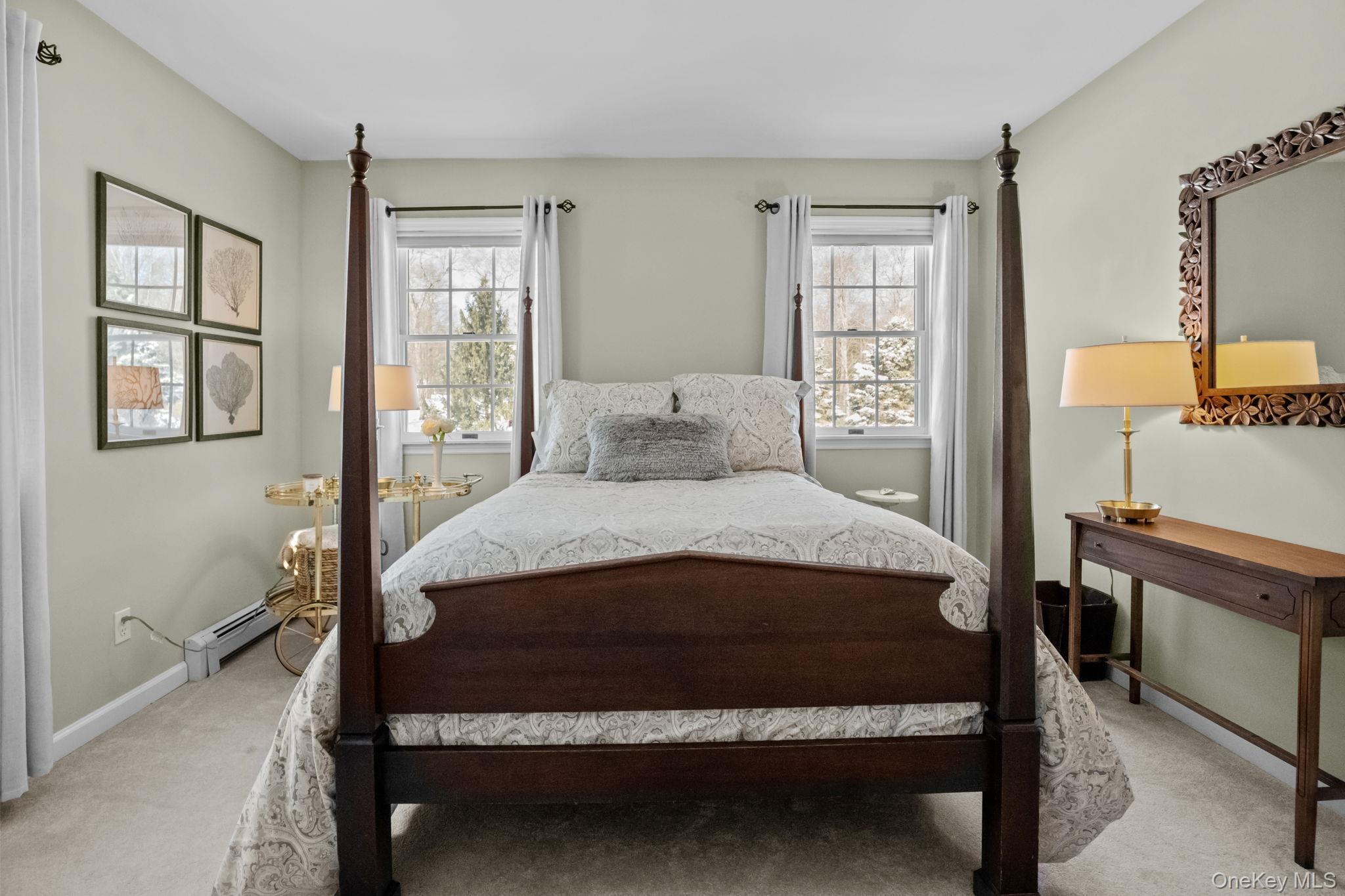 6 Ridge Circle Mahopac, NY 10541 - Photo 34 of 49 a bed sitting in a bedroom next to a window