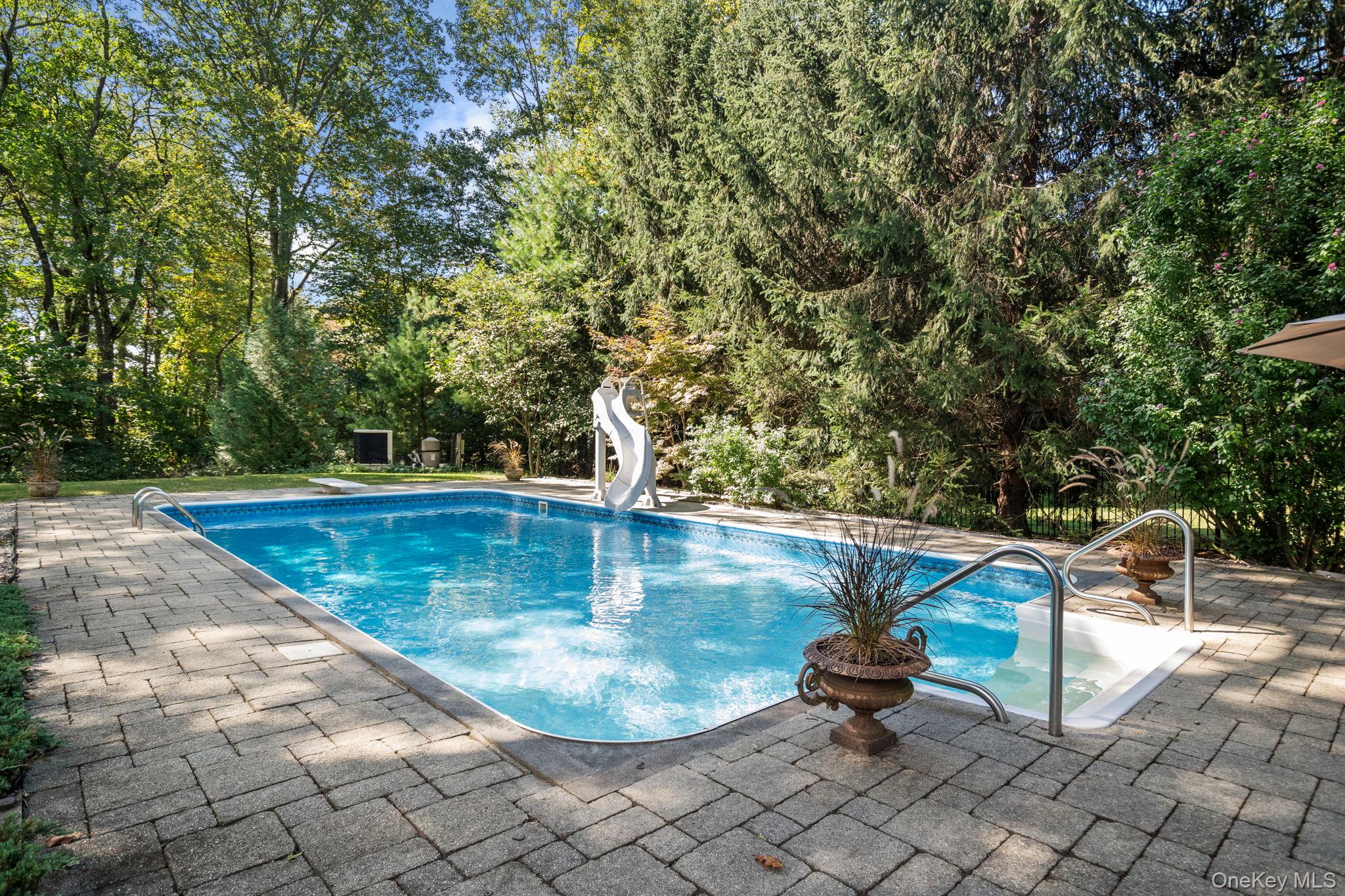 6 Ridge Circle Mahopac, NY 10541 - Photo 37 of 49 a view of a swimming pool with a yard
