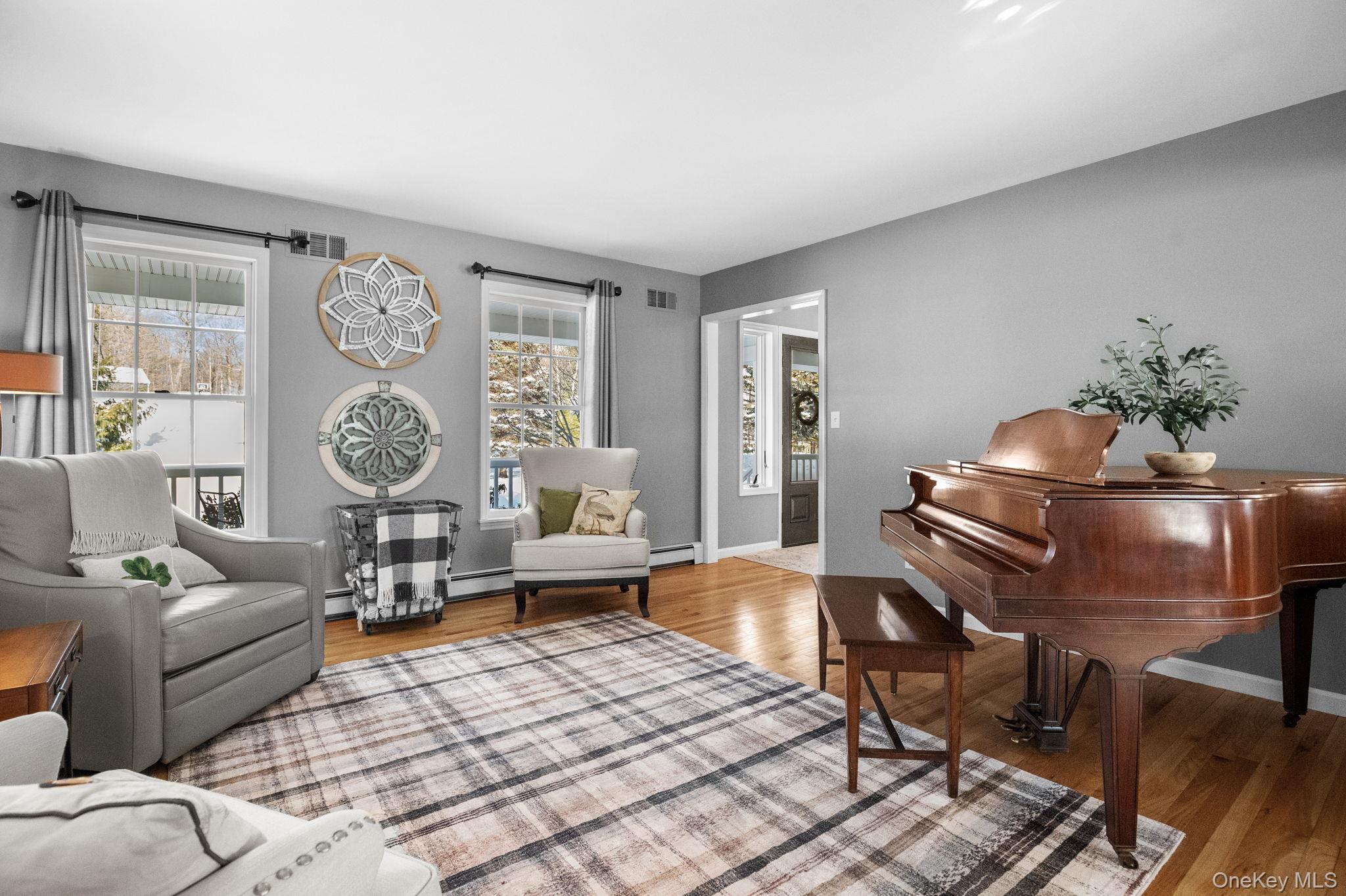 6 Ridge Circle Mahopac, NY 10541 - Photo 4 of 49 a living room with furniture and a large window