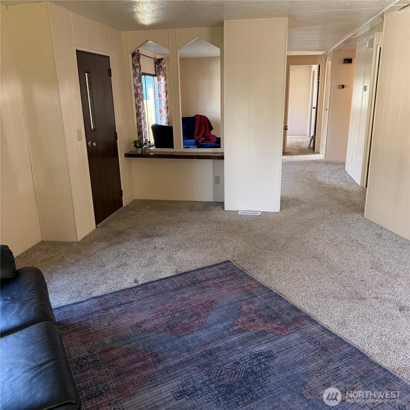 920 Maple Street, Unit 11 Sedro-Woolley, WA 98284 - Photo 6 of 13 a view of a living room with a wooden floor