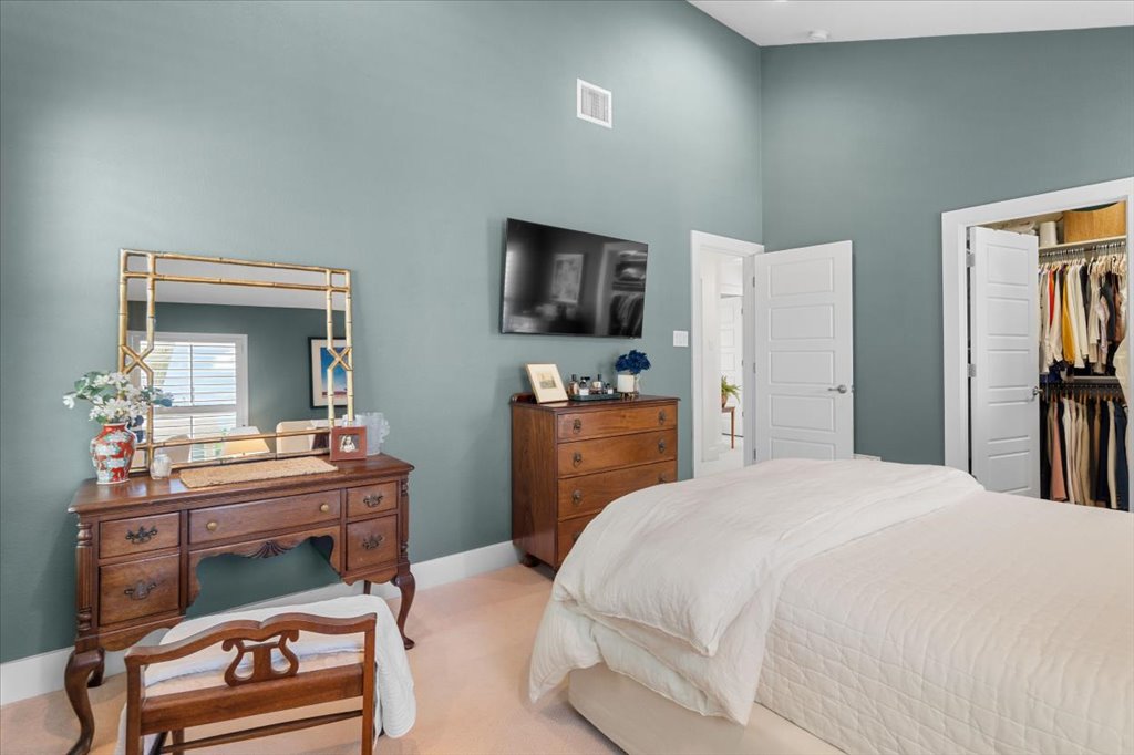 12200 Tawny Farms Road, Unit 139 Austin, TX 78748 - Photo 17 of 30 The soft, earth-toned walls give the room a deeply calming, boutique-hotel vibe.