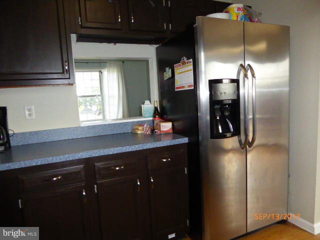 80 Briar Run Drive Ranson, WV 25438 - Photo 12 of 30 Kitchen with pass through to Living Room