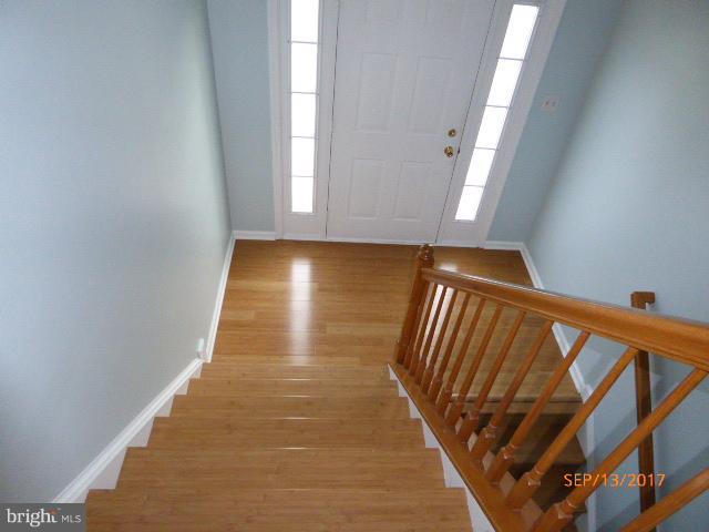 80 Briar Run Drive Ranson, WV 25438 - Photo 16 of 30 Hardwood stairway to lower level