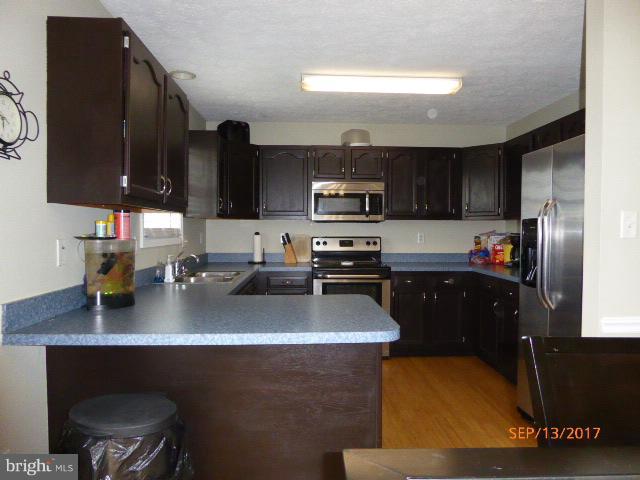 80 Briar Run Drive Ranson, WV 25438 - Photo 3 of 30 Roomy kitchen with lots of counter space