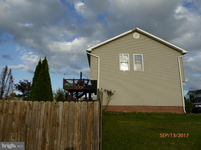 80 Briar Run Drive Ranson, WV 25438 - Photo 25 of 30 Left exterior with fence & deck view