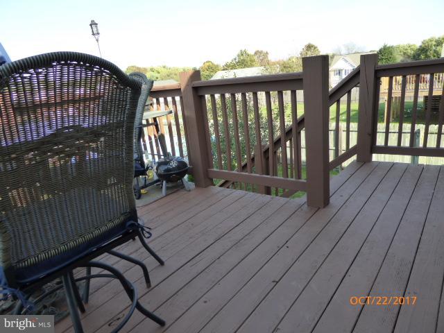80 Briar Run Drive Ranson, WV 25438 - Photo 29 of 30 Large deck with stairs accessing rear yard