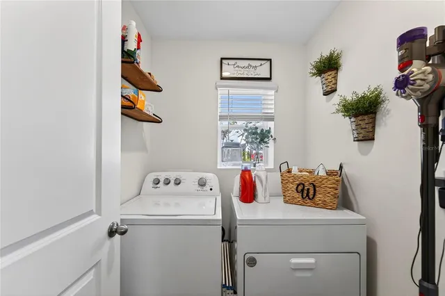 a utility room with dryer and washer