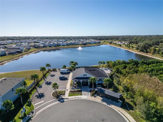 an aerial view of a houses with a outdoor space