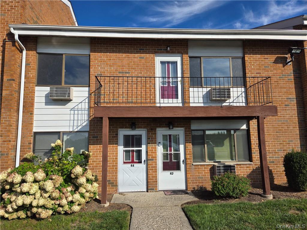 44 Inwood Road Middletown, NY 10941 - Photo 2 of 15 View of front facade featuring a balcony and central AC