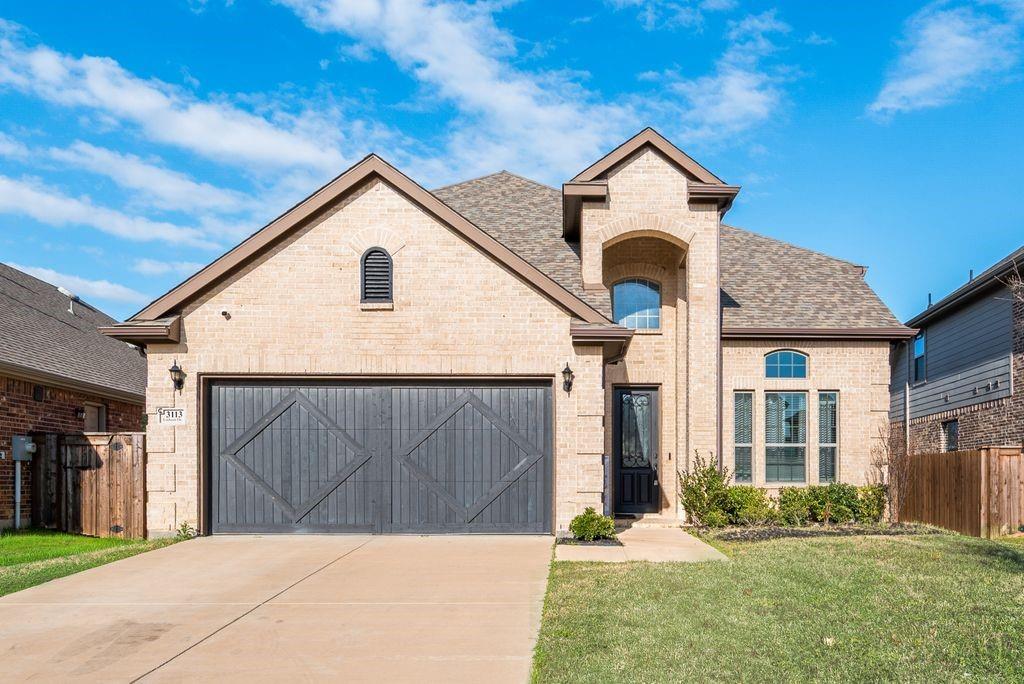 3113 Linham Drive Mansfield, TX 76084 - Photo 1 of 1 a front view of a house with garden