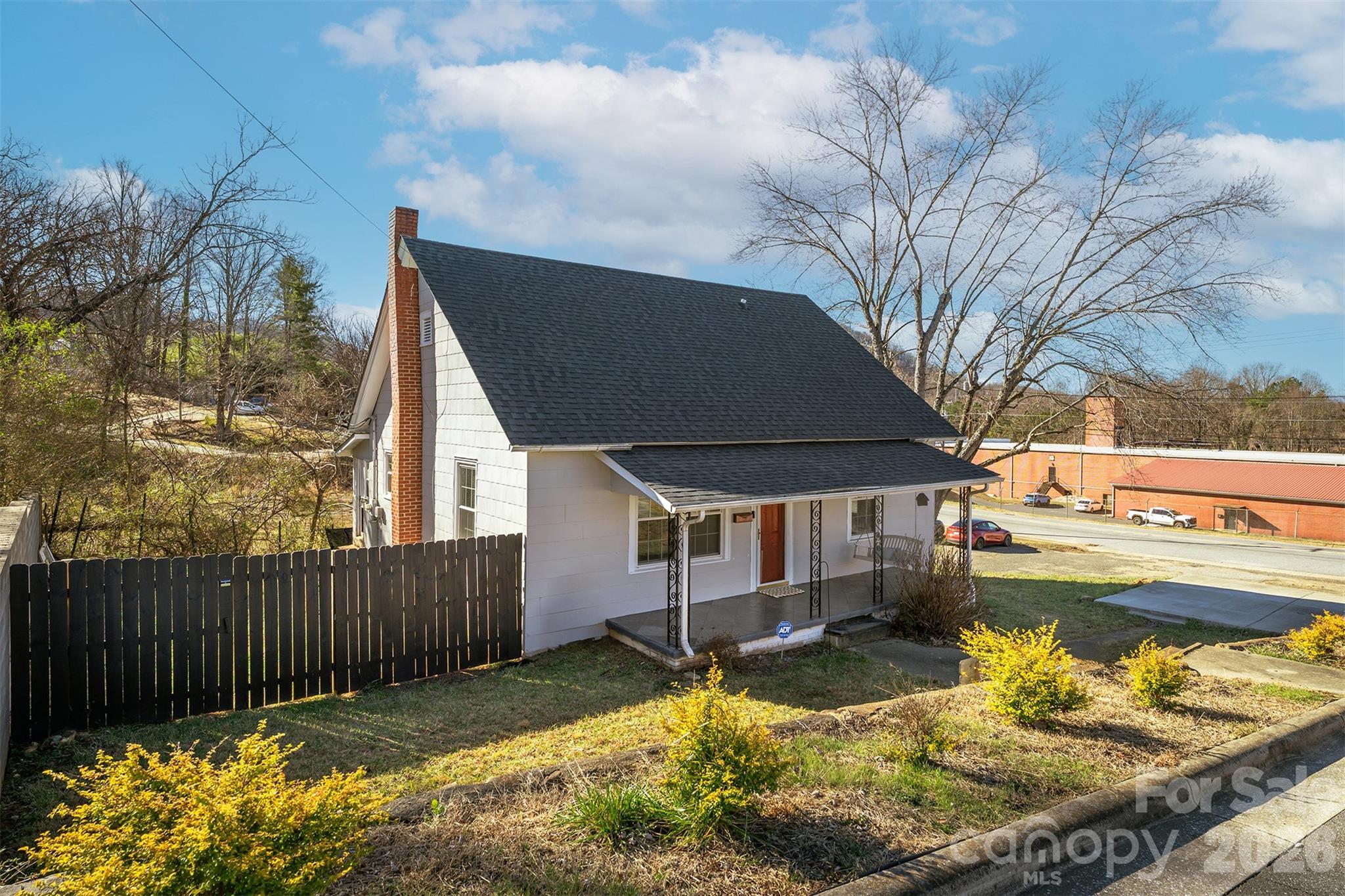 a view of swimming pool with a backyard