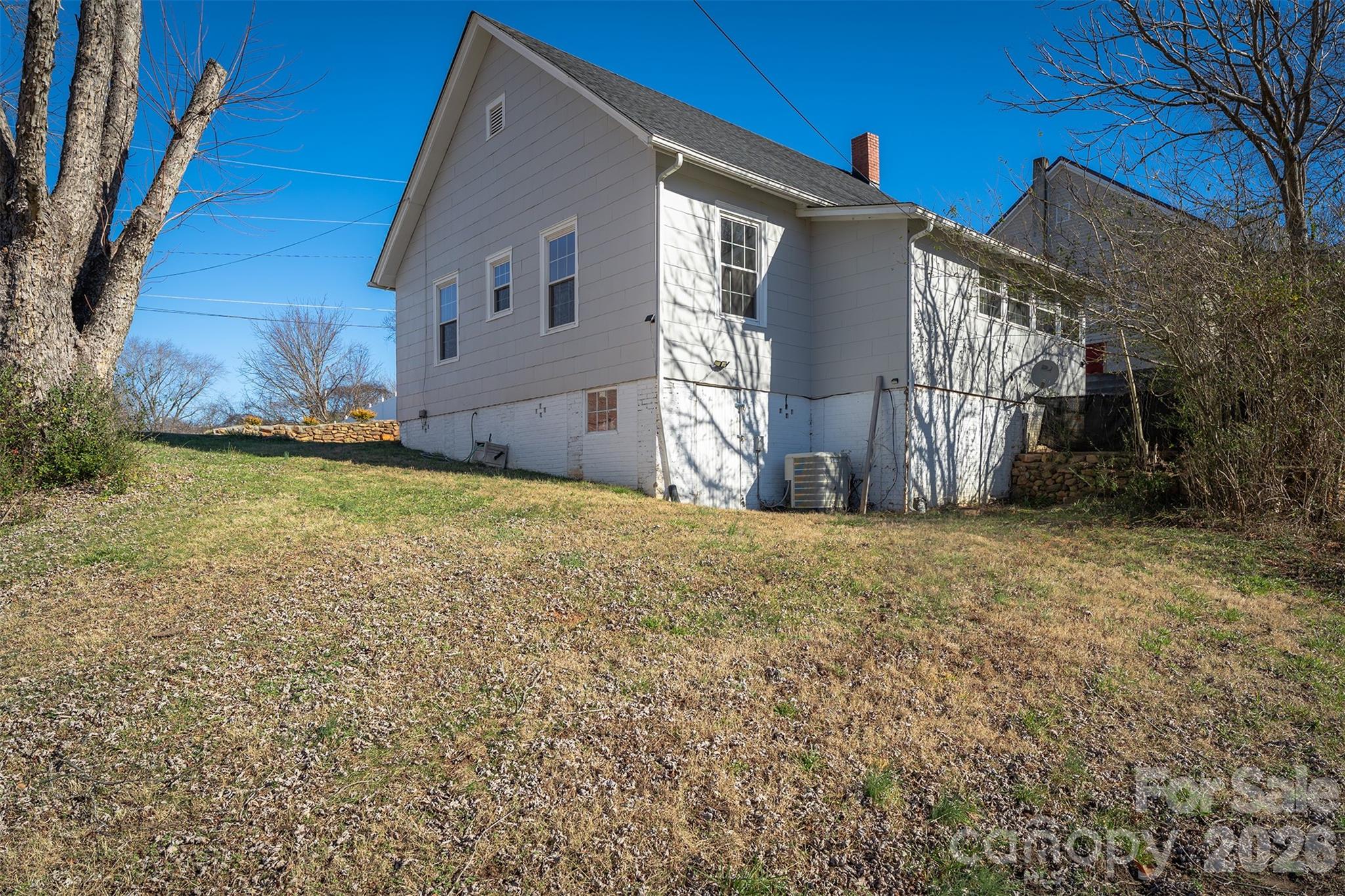 20 1st Street Marion, NC 28752 - Photo 19 of 23 a view of a house with a yard