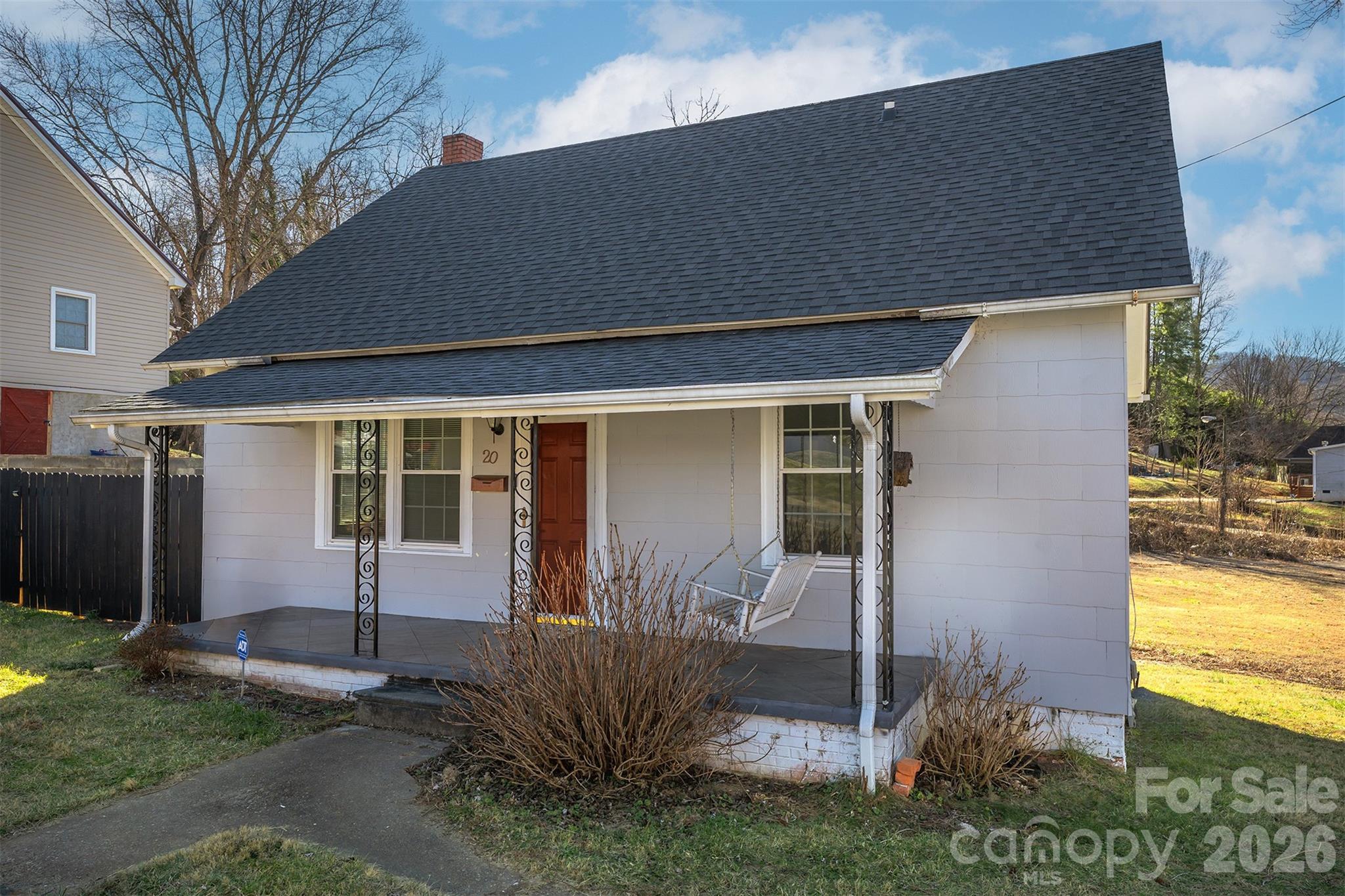 20 1st Street Marion, NC 28752 - Photo 2 of 23 a front view of a house having yard