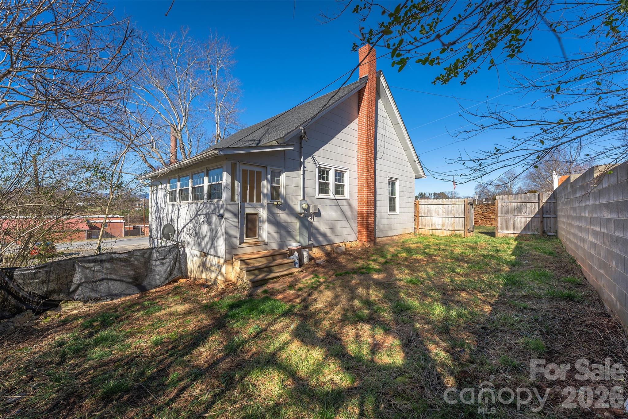 20 1st Street Marion, NC 28752 - Photo 3 of 23 a view of a house with a yard