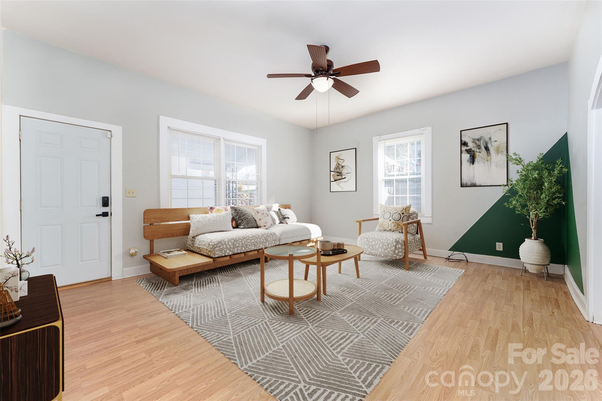 20 1st Street Marion, NC 28752 - Photo 4 of 23 a living room with furniture and a flat screen tv