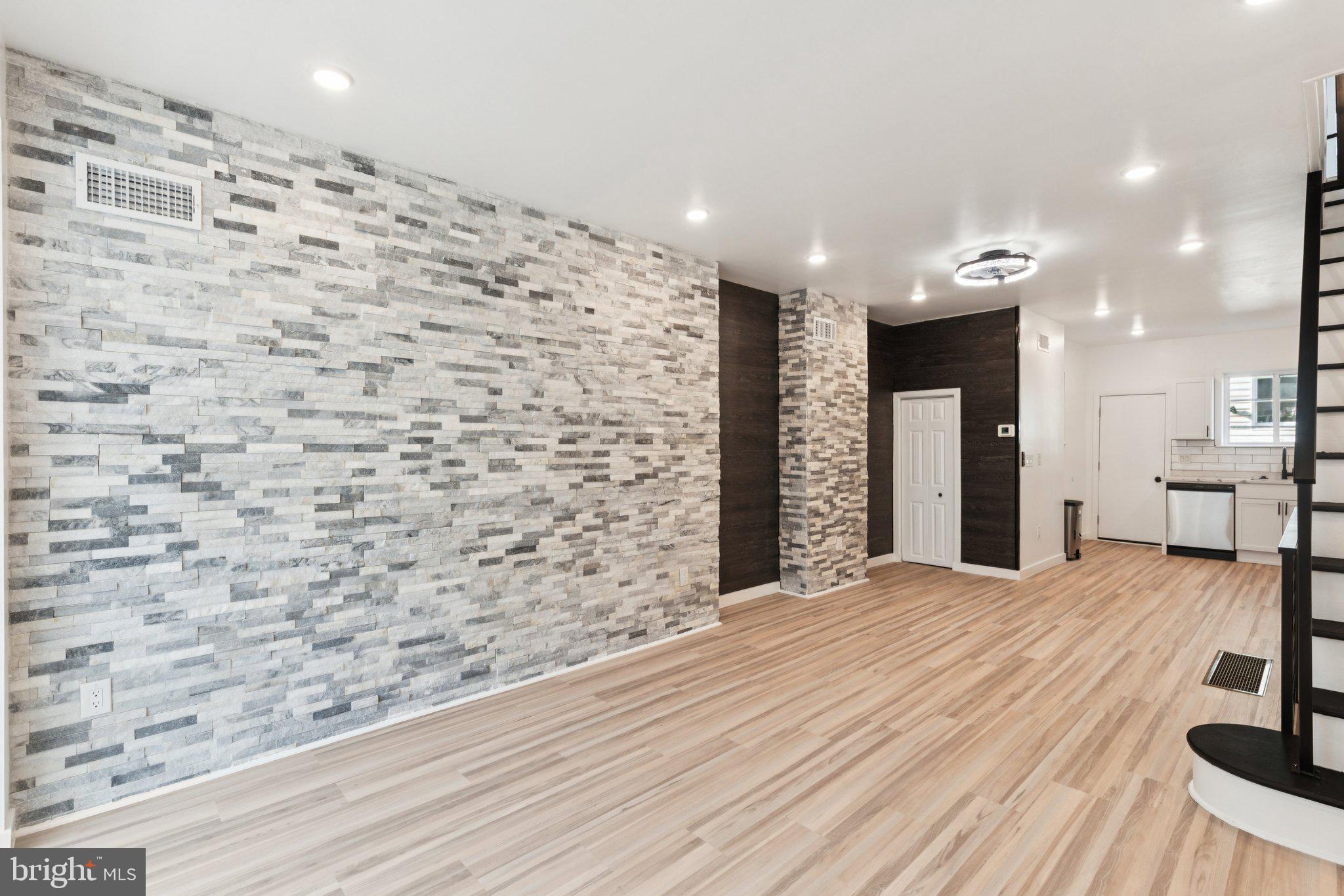a spacious bathroom with a shower and a bathtub