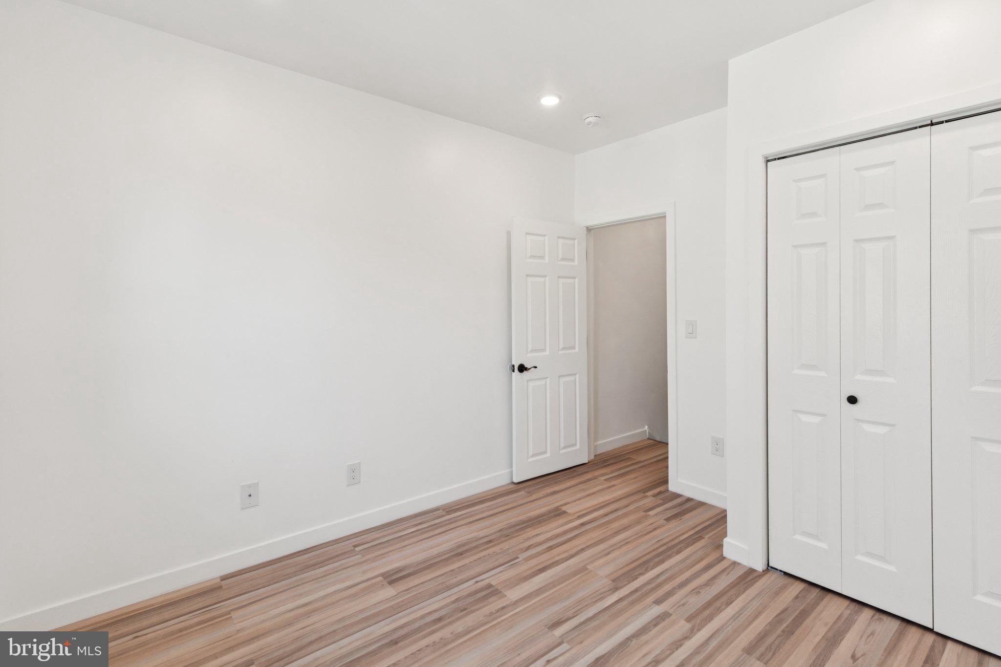 2242 South Bonsall Street Philadelphia, PA 19145 - Photo 12 of 21 a view of an empty room with wooden floor
