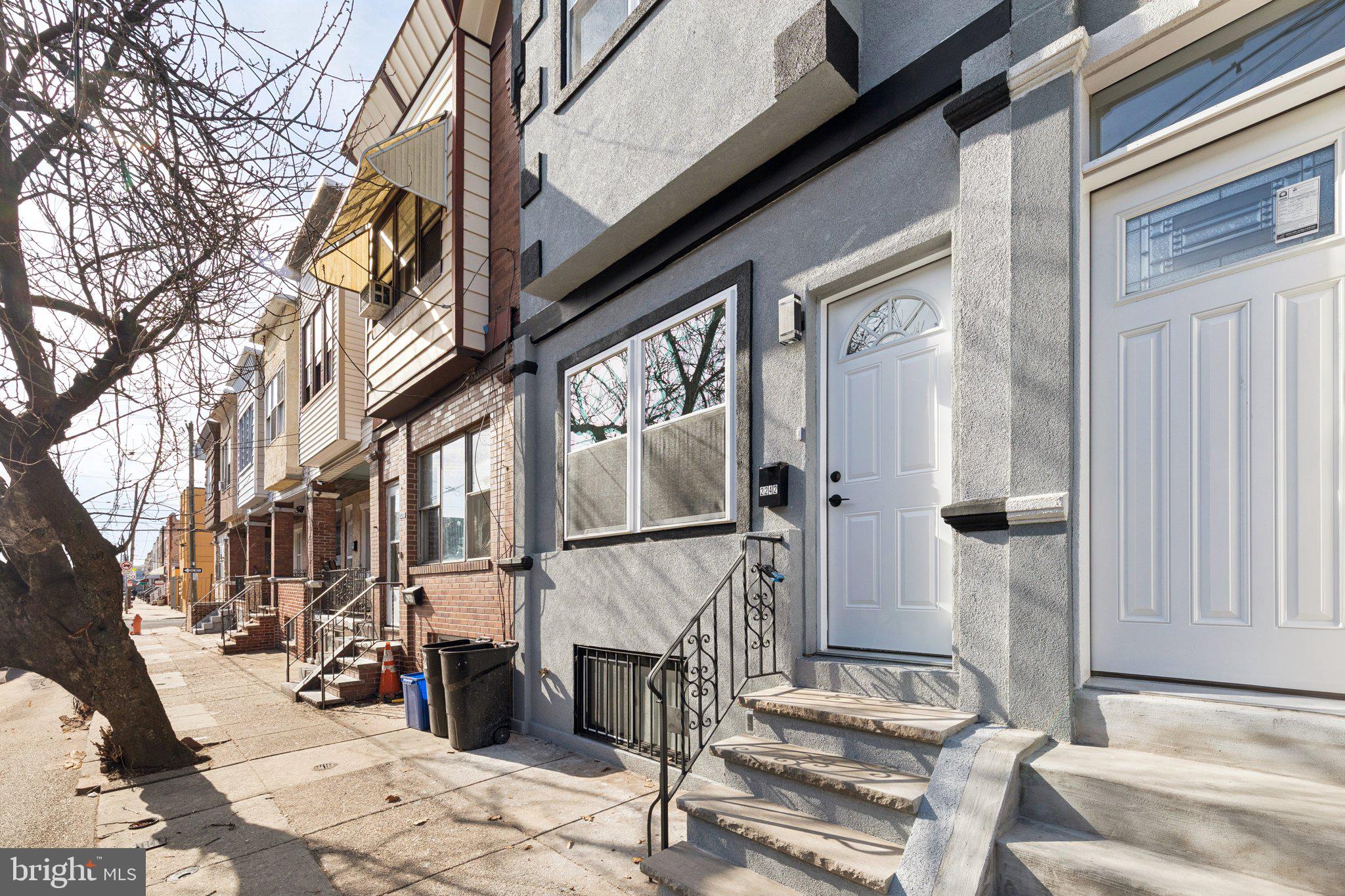 2242 South Bonsall Street Philadelphia, PA 19145 - Photo 21 of 21 a front view of a building with street view