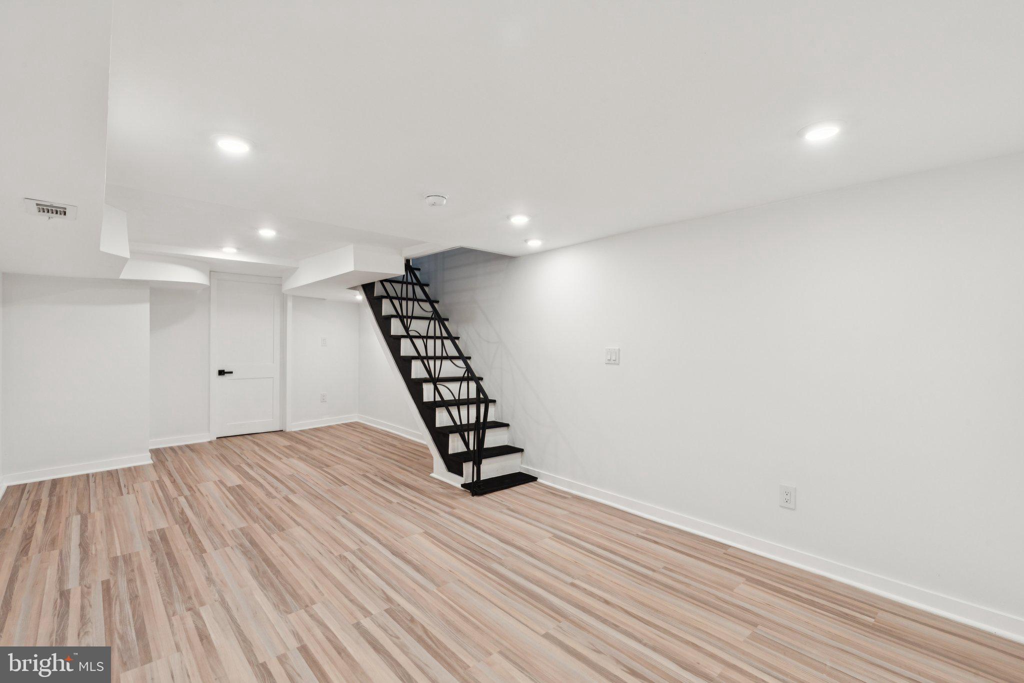 2242 South Bonsall Street Philadelphia, PA 19145 - Photo 7 of 21 a view of an empty room with wooden floor