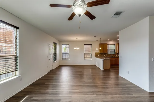a view of kitchen and windows