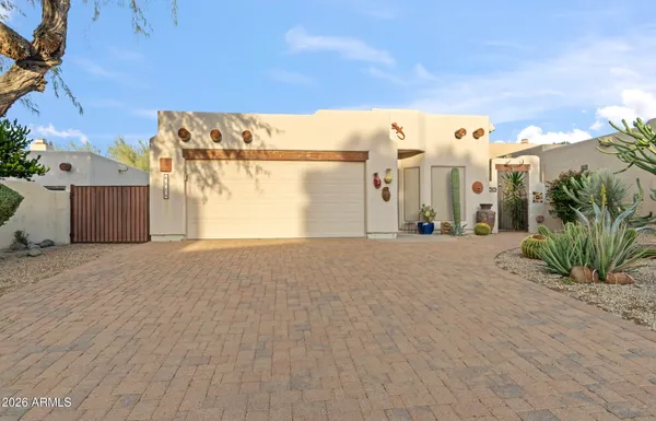 a view of a backyard of the house