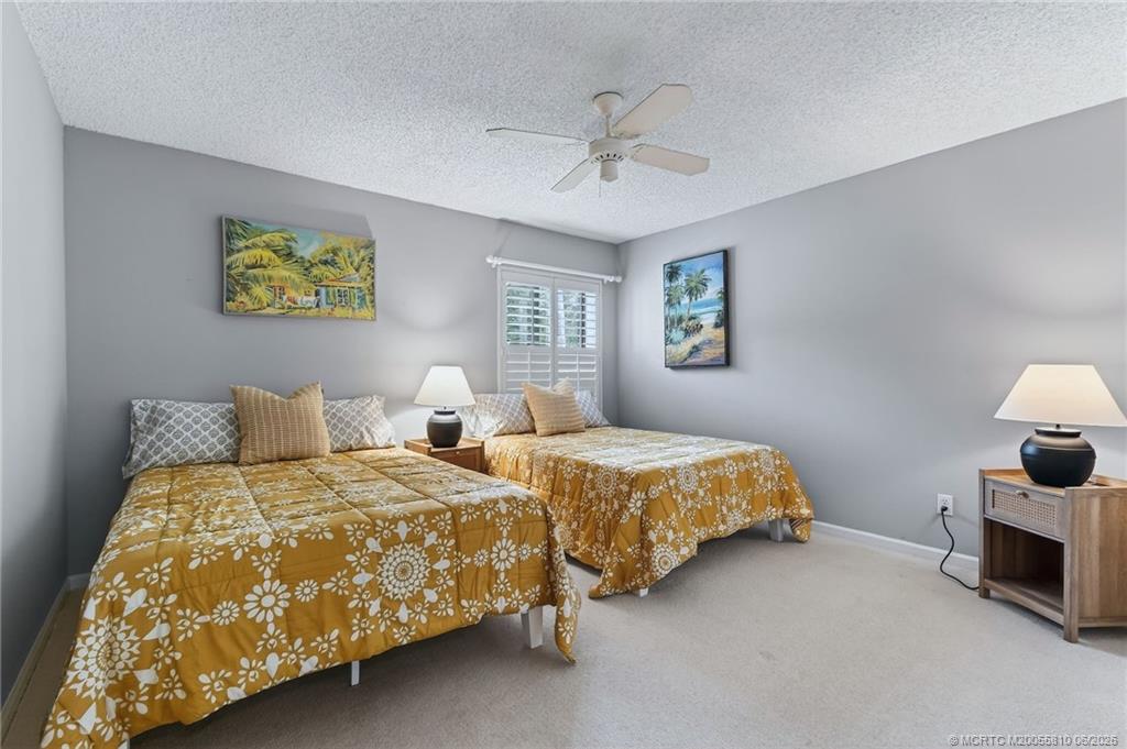 5152 Southeast Club Way, Unit 104 Stuart, FL 34997 - Photo 30 of 43 Guest Gedroom