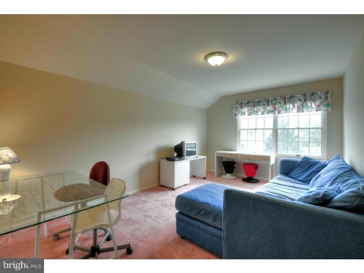 20 Zaitz Farm Road Princeton Junction, NJ 08550 - Photo 20 of 25 a living room with furniture a fireplace and a window