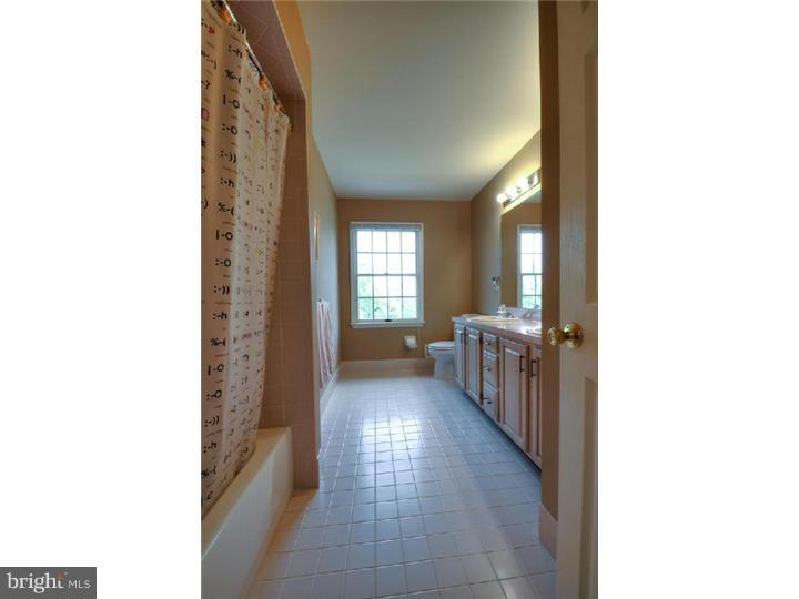 20 Zaitz Farm Road Princeton Junction, NJ 08550 - Photo 21 of 25 a view of a hallway with furniture and windows